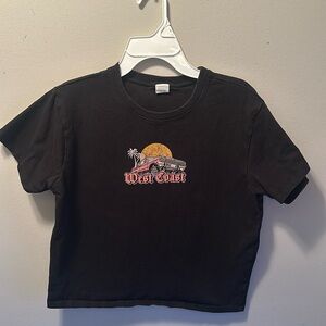 I am selling this crop top that has a west coast lowrider on the front.